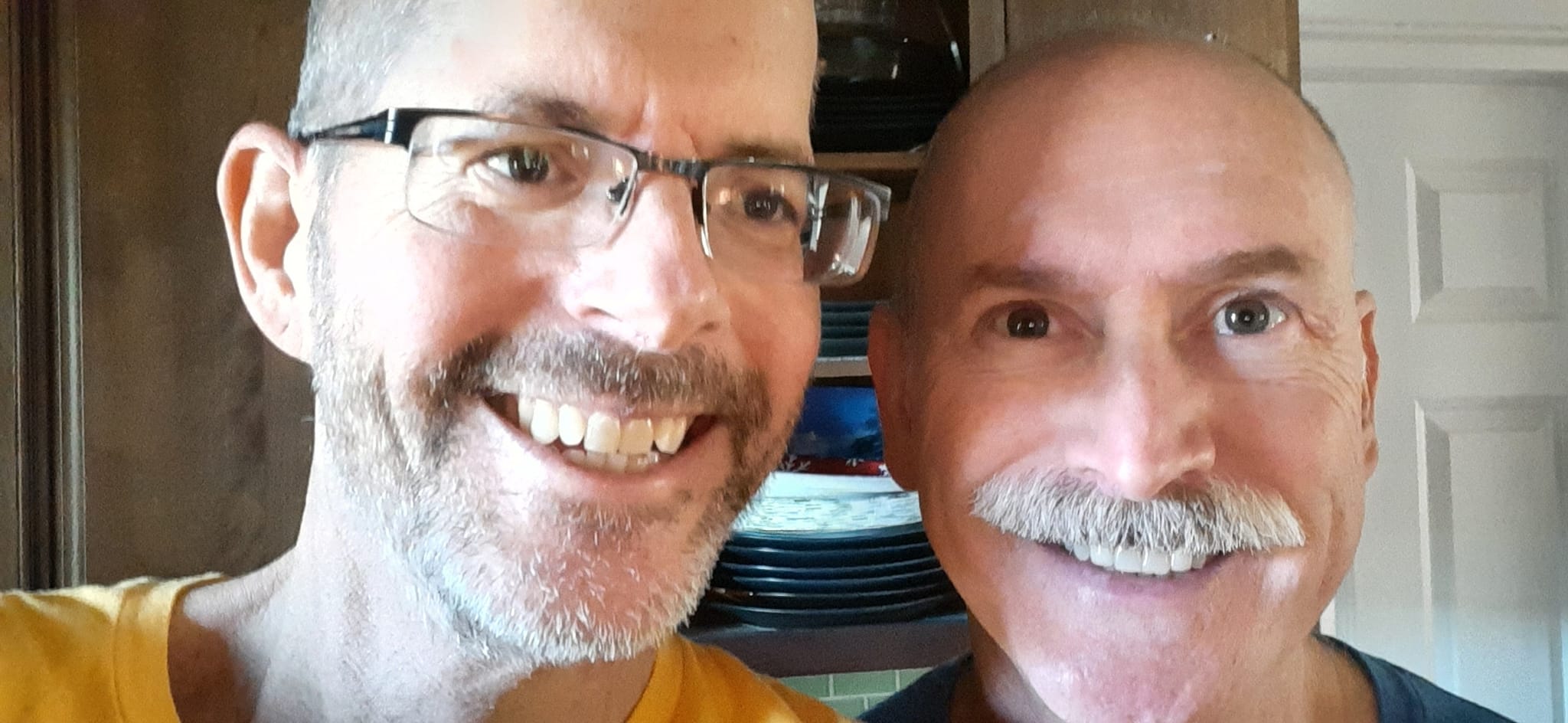 A smiling photo of Richard with Cal